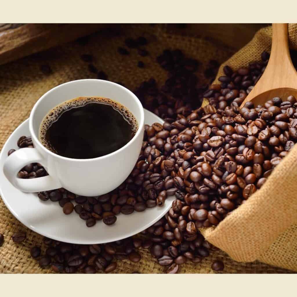 image of coffee and beans for the postHow Do They Get Caffeine Out Of The Coffee Bean By Using Swiss Water? 5 Steps They Take For The Best Tasting Decaffeinated Coffee
